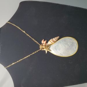 Bijou Drive Gold Sea shell necklace with spiral sea shell,gold star fish,beads